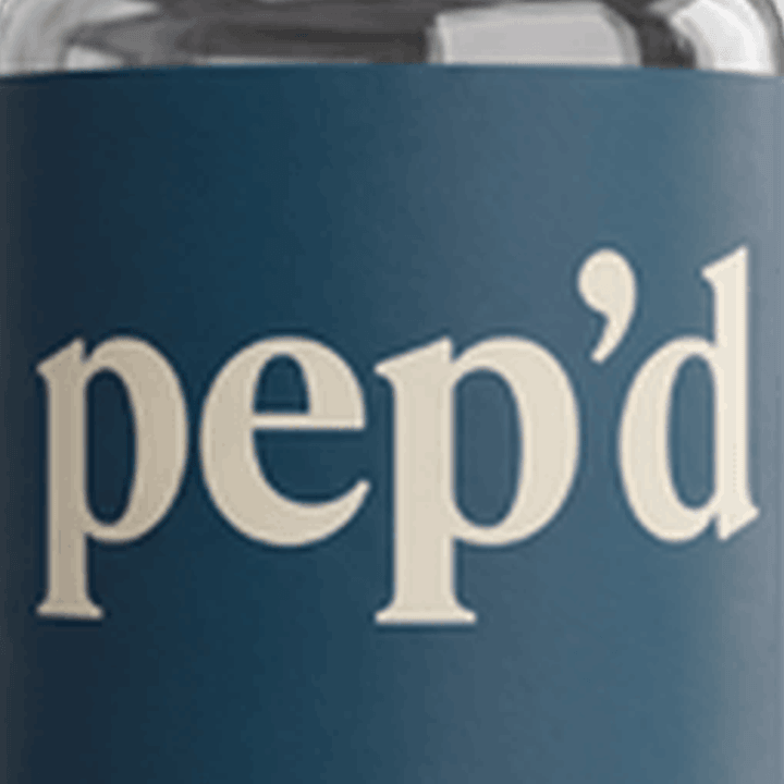 Pep’d NAD+ Therapy Rx close up on a deeper mint background