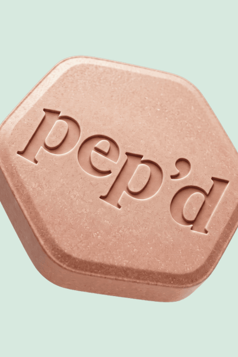 Get Pep’d Oral Minoxidil Rx close up on a deeper mint background