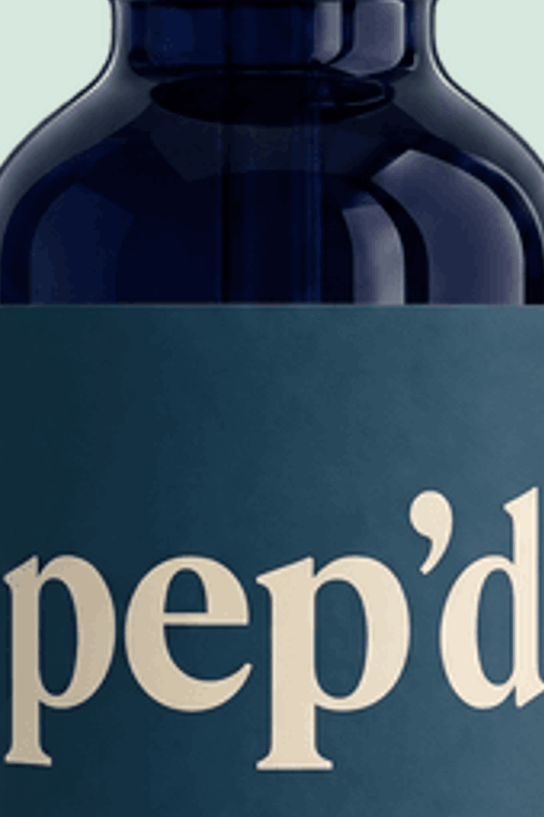 Get Pep’d Topical Minoxidil Rx close up on a deeper mint background